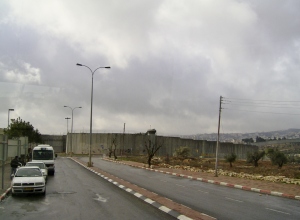 Approaching the "Separation Wall" (a.k.a. the West Bank Wall) where visitors must stop to change vehicles before entering Bethlehem.